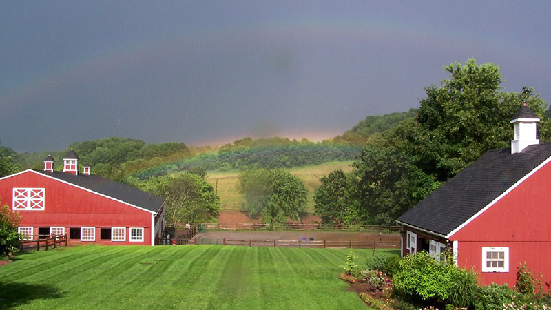 Beautiful Barn with Rainbow Above